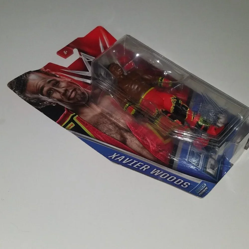 WWE Xavier Woods Action Figure (new toy with noticeable packaging wear) AS IS